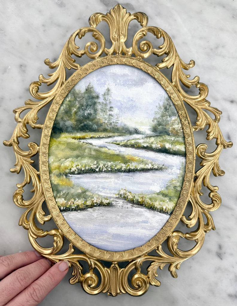 Landscape in gold vintage frame