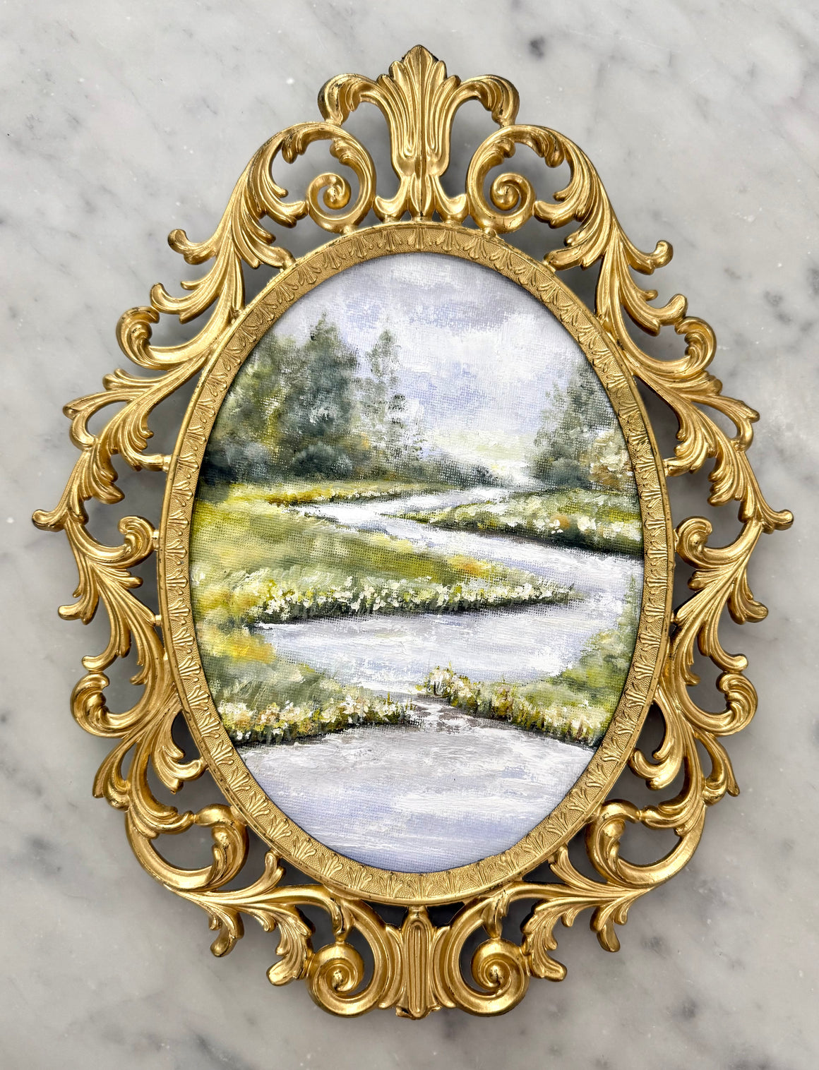 Landscape in gold vintage frame