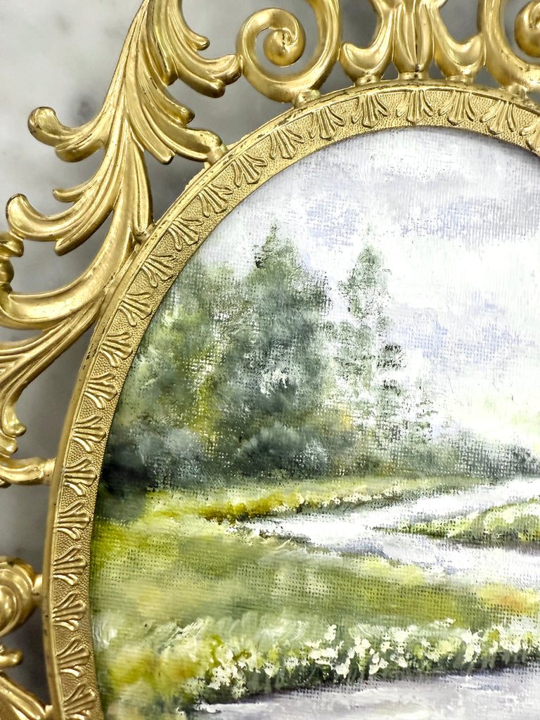 Landscape in gold vintage frame
