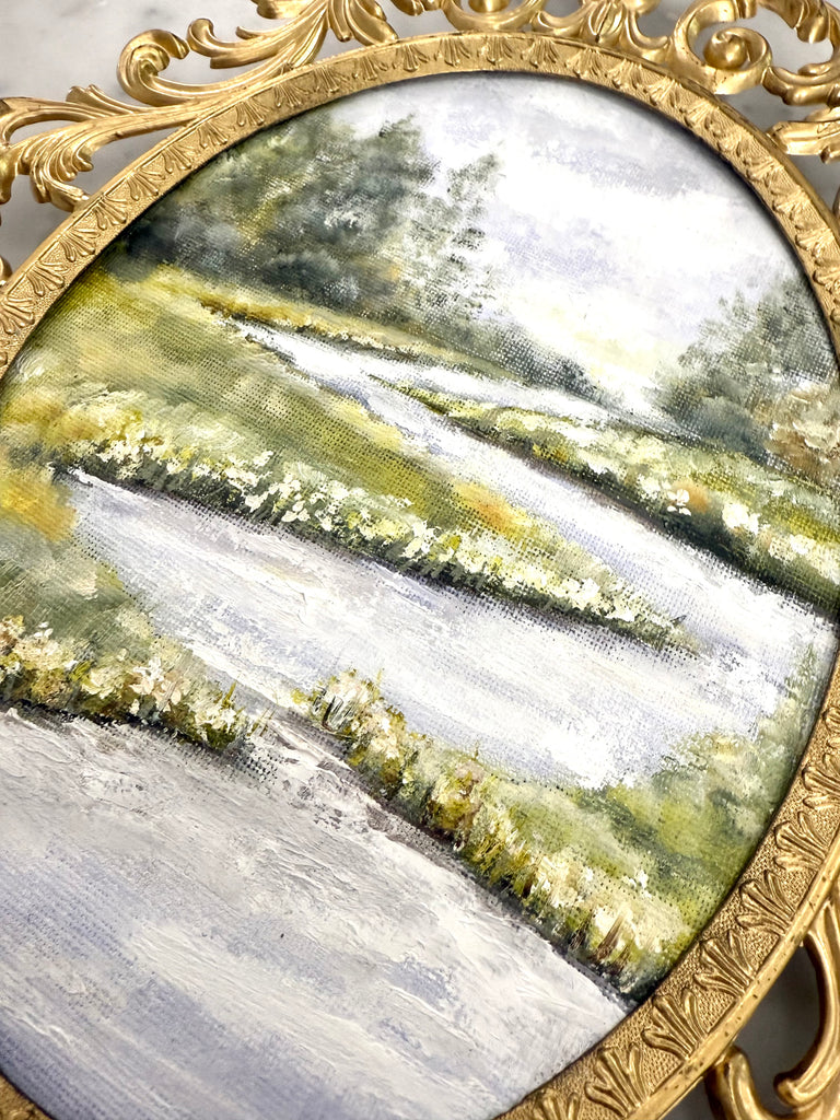 Landscape in gold vintage frame