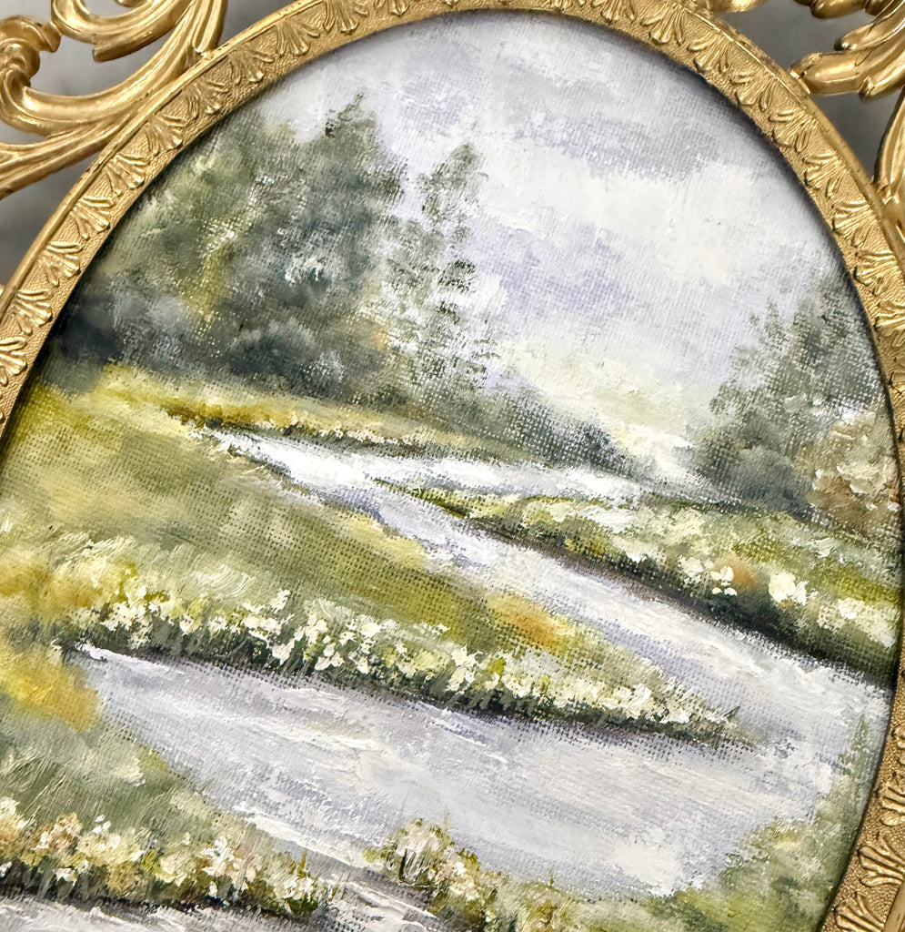 Landscape in gold vintage frame